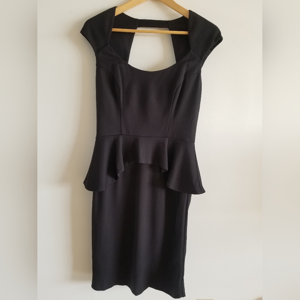 Black Peplum Dress with Keyhole Back by Bebe - size medium